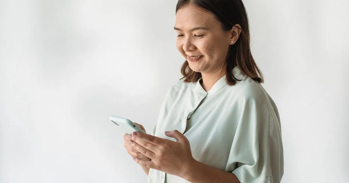 Borrower receiving an instant loan approval notification on her phone